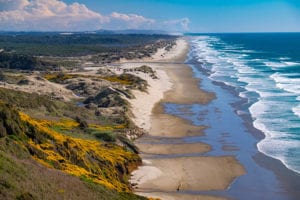 Oregon Coast is a great place to travel in a 2wd Ford Econoline Sportsmobile campervan