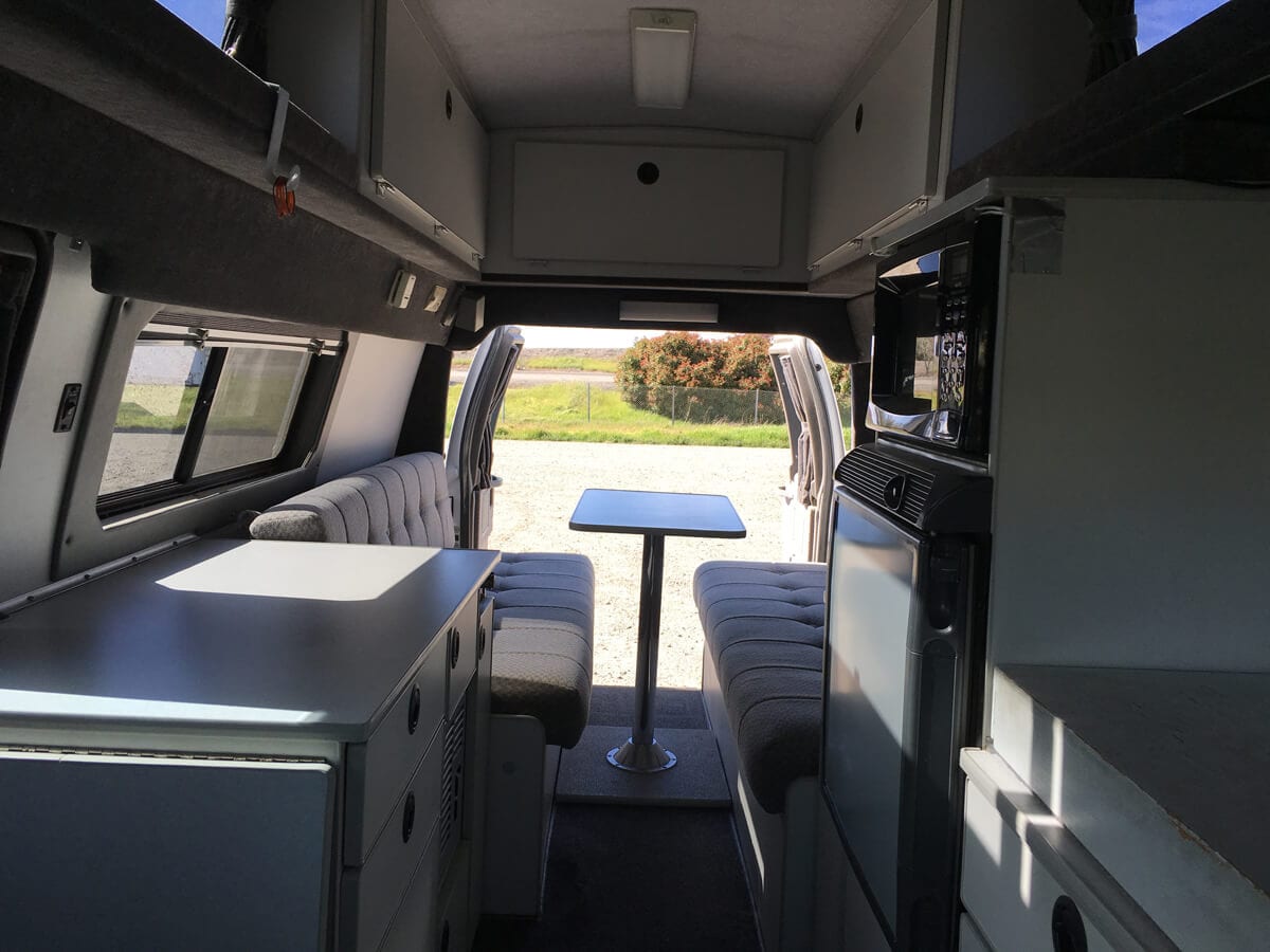 Inside new Sportsmobile 2005 Ford Econoline with Fiverine top for rent in Oregon