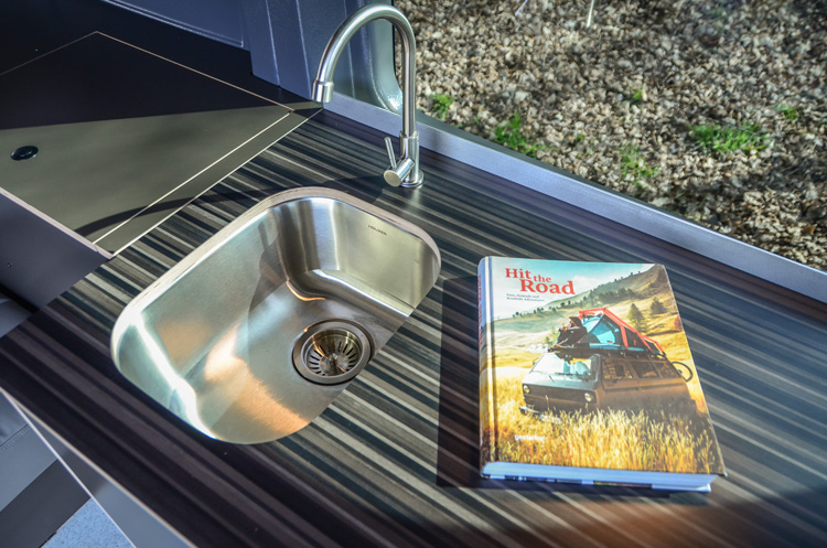 Converted Ford Transit campervan in Oregon with 2 beds and kitchen with nice large counter top