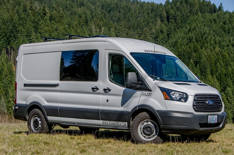 Exterior shot of passenger side of Ford Transit Campervan built by Axis Vehicle Outfitters in Portland, Oregon
