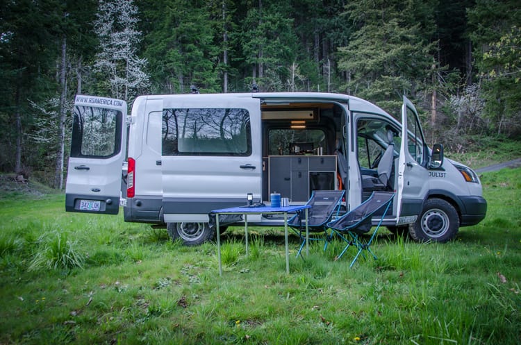Exterior shot of passenger side of Ford Transit Campervan built by Axis Vehicle Outfitters in Portland, Oregon