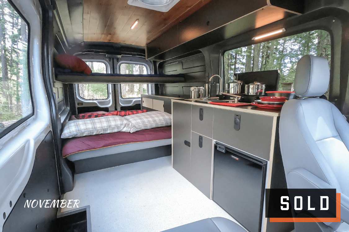Look inside of Ford Transit Campervan for sale built by Axis Vehicle Outfitters in Portland, Oregon