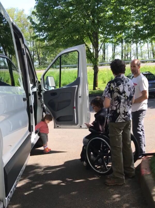 Showing customers the new Ford Transit campervan rental in Portland, Oregon