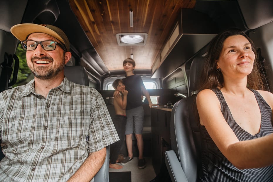 Family of four inside the Roamerica campervan rental on an Oregon road trip