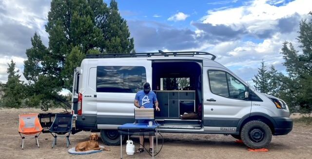 Cooking dinner out of a campervan